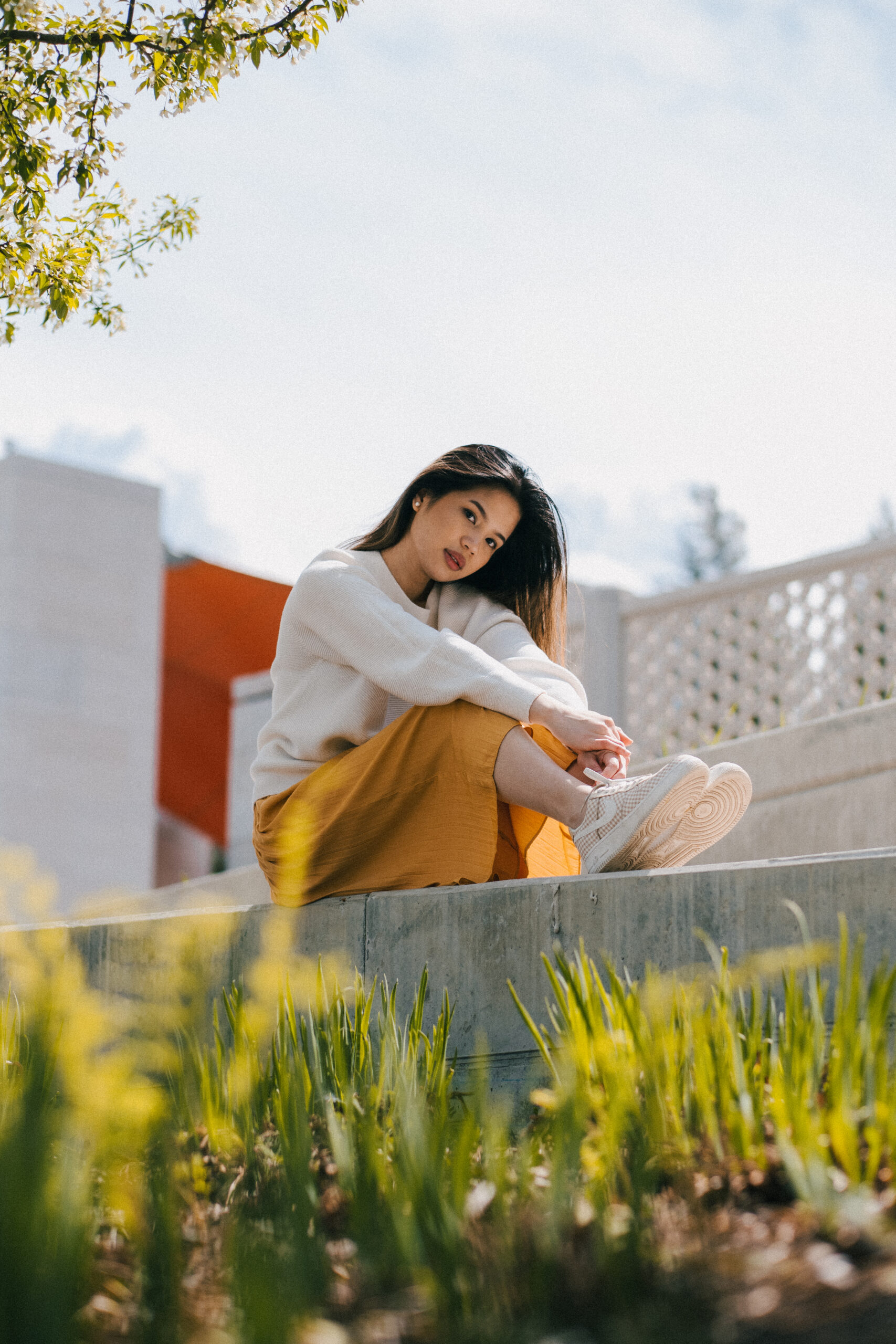 Portrait of a woman sitting on the ground